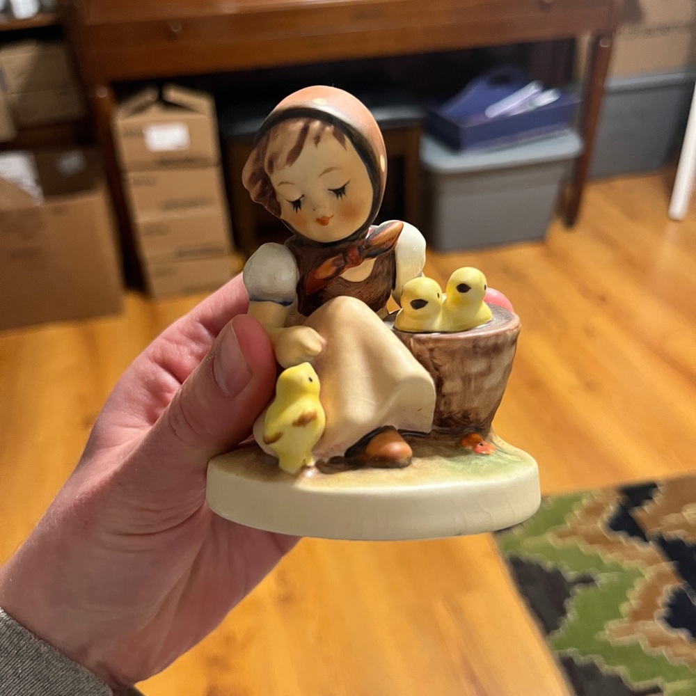 Charming Figurine with Yellow Accents